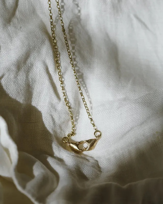 A Quiet Bond | Hand Heart Gold Necklace — Dovilė Bertulytė