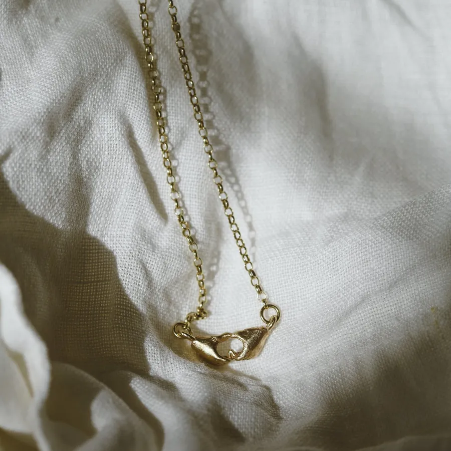 A Quiet Bond | Hand Heart Gold Necklace — Dovilė Bertulytė