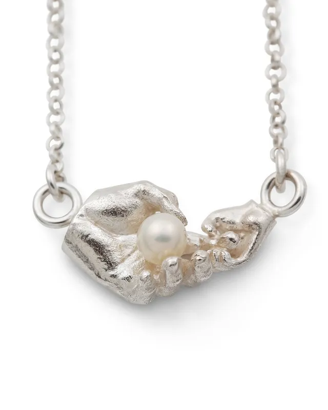 Mother & Child | White Pearl and Two Silver Hands Pendant — Dovilė Bertulytė