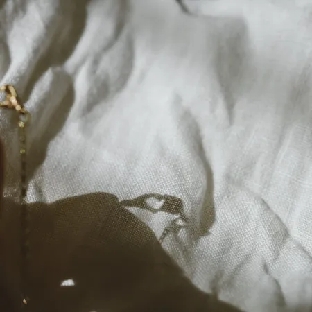 A Quiet Bond | Hand Heart Gold Necklace