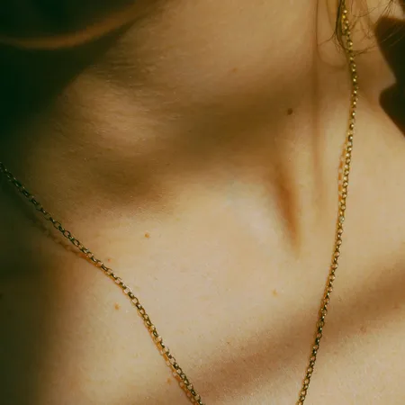 A Quiet Bond | Hand Heart Gold Necklace