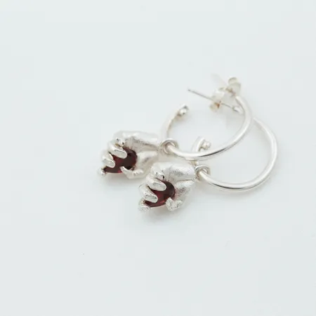 Dextera | Miniature Hand Silver Hoop Earrings With Red Garnets