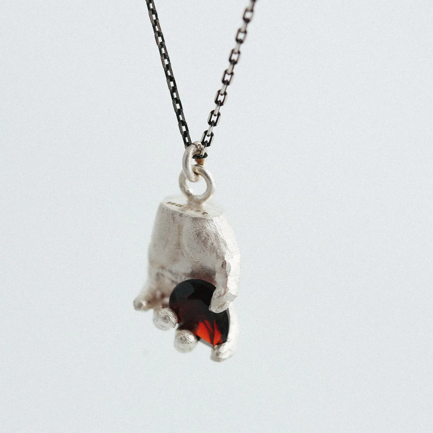 Dovilė Bertulytė miniature silver hand pendant