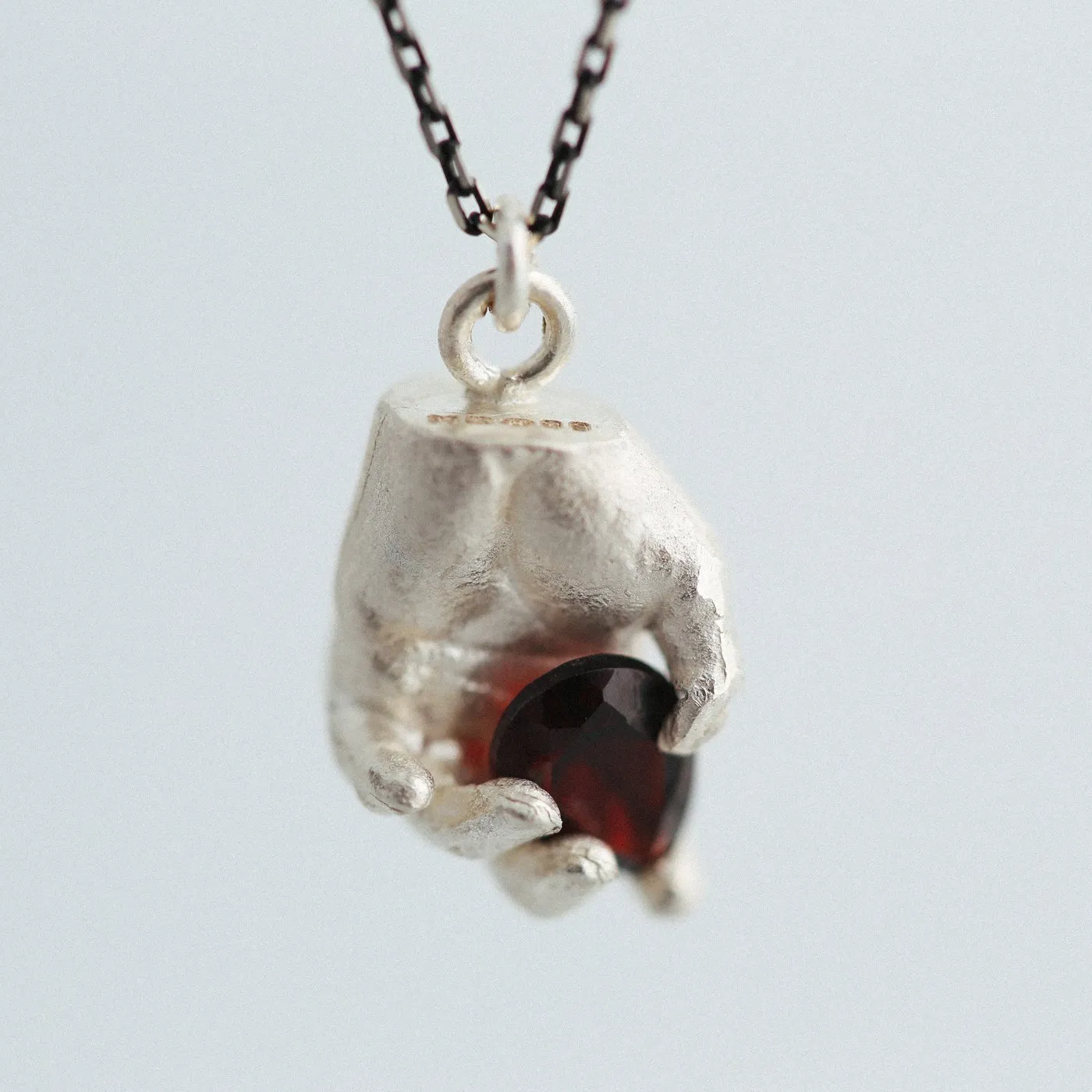 Dovile Bertulyte miniature silver hand pendant